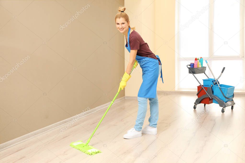woman moping floor 