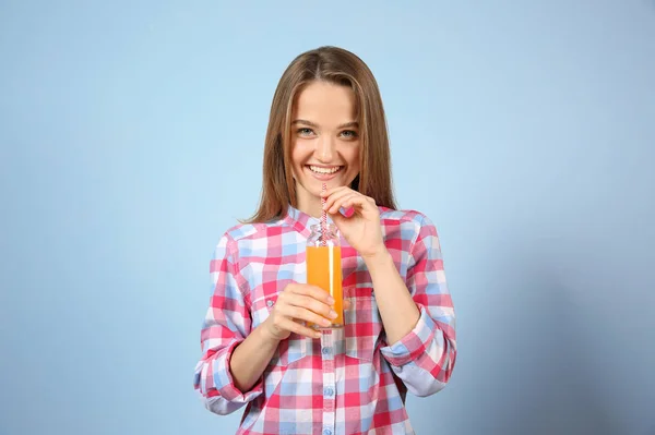Young woman with glass of fresh juice — Stock Photo, Image