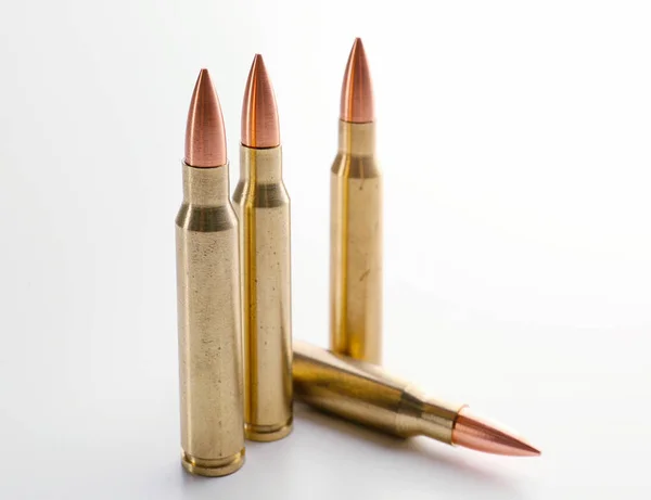 Rifle bullets on background — Stock Photo, Image