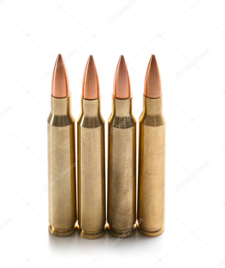 Rifle bullets on background