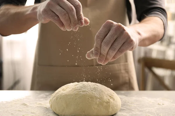 Man baking bread