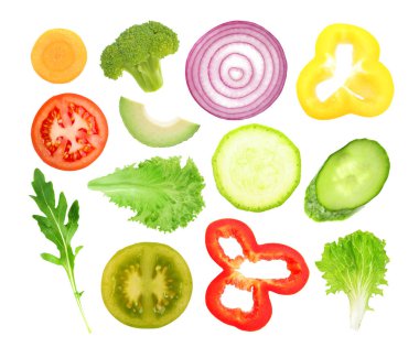 Vegetables slices on white background clipart