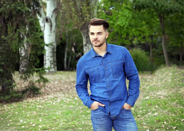 Handsome man in park — Stock Photo, Image