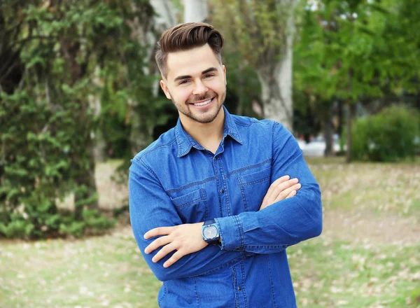 Handsome man in park — Stock Photo, Image