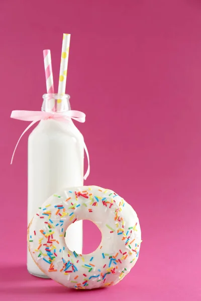 Donut and bottle of milk — Stock Photo, Image