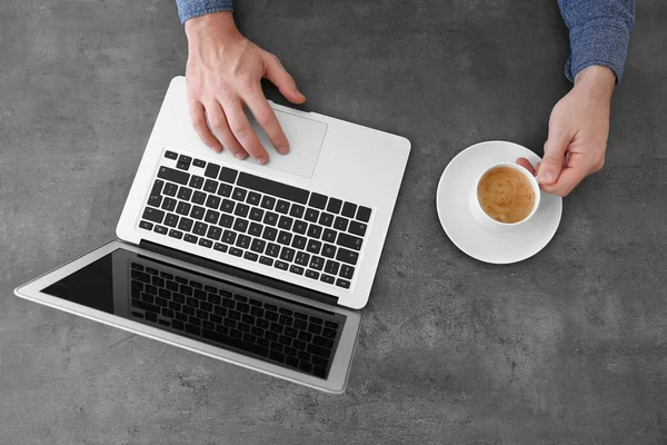 Hands of man with laptop — Stock Photo, Image