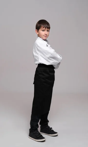 Lindo chico en uniforme de chef — Foto de Stock