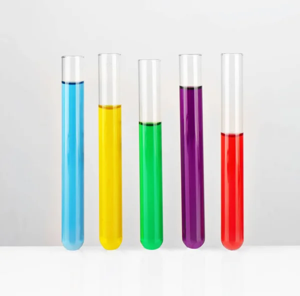 Test tubes with colourful samples — Stock Photo, Image