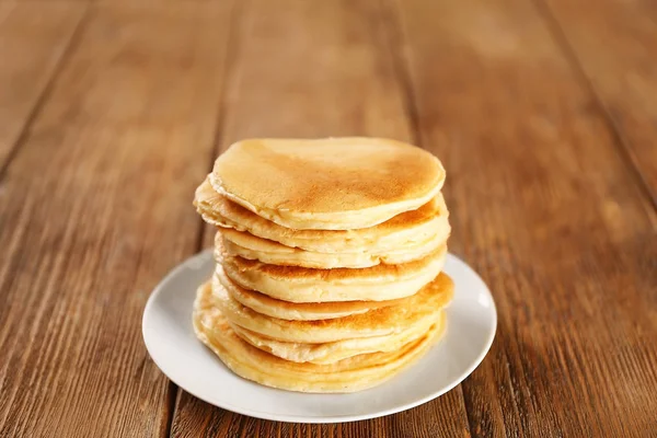 Delicious pancakes on table — Stock Photo, Image
