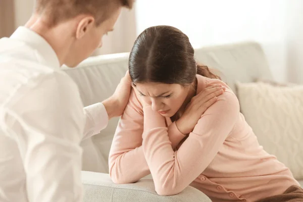 Depressed woman with boyfriend — Stock Photo, Image