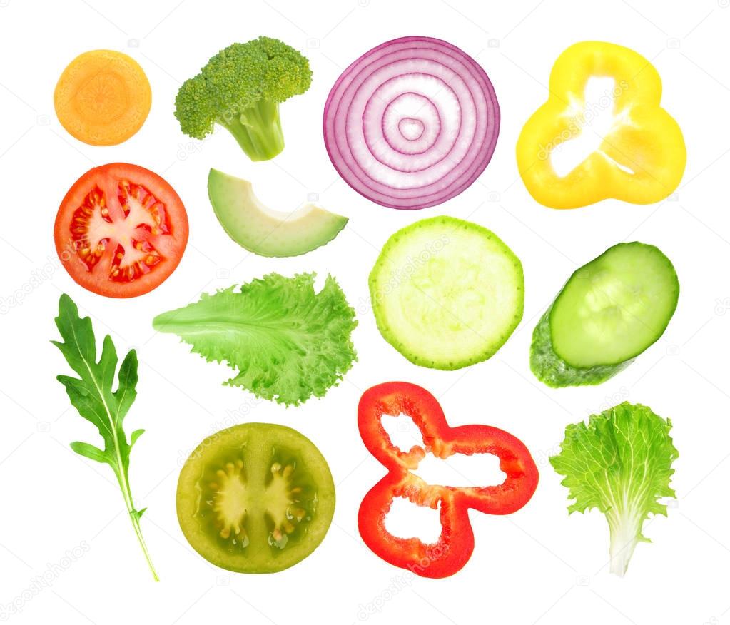 Vegetables slices on white background