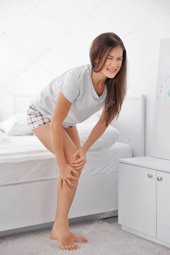 woman having knee ache