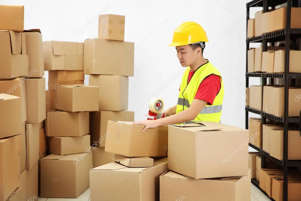 Man packing parcels 