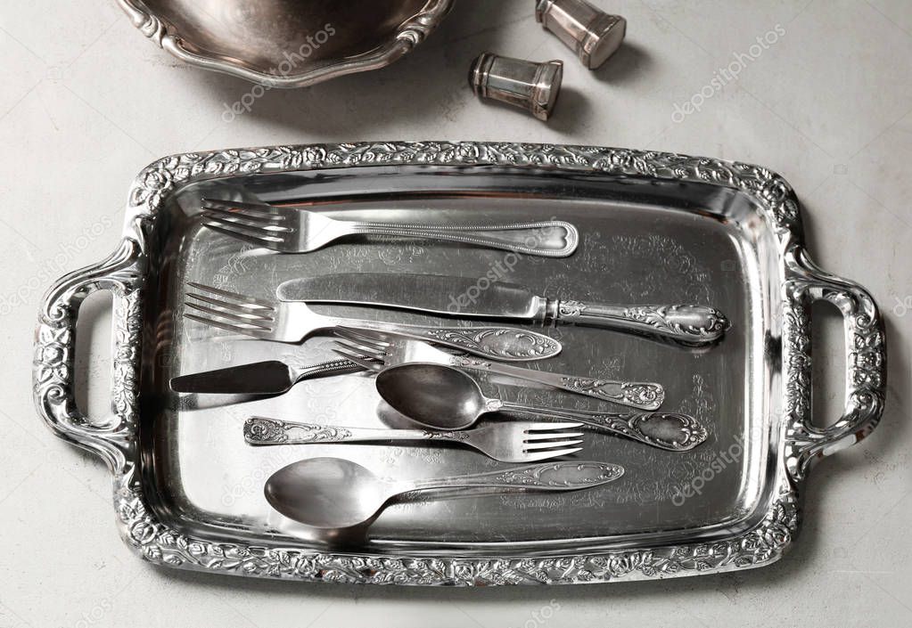 Set of silverware on background