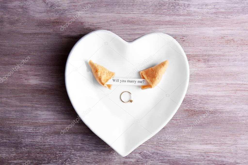 Fortune cookie with golden ring