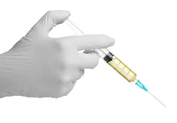 上交所与液体在白色背景上的白色手套控股注射器 — 图库照片