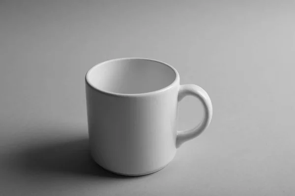 Blank ceramic cup on grey background — Stock Photo, Image