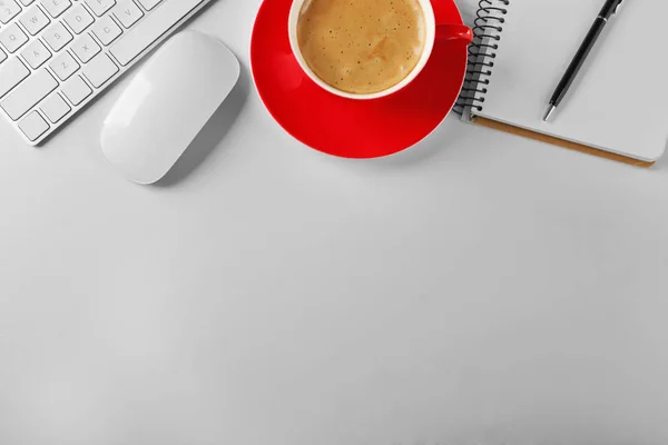 Workplace with cup of coffee — Stock Photo, Image