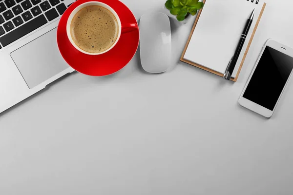 Workplace with cup of coffee — Stock Photo, Image