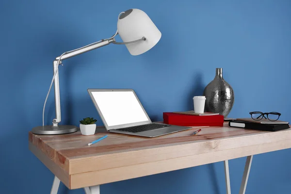 Workplace with laptop on table — Stock Photo, Image