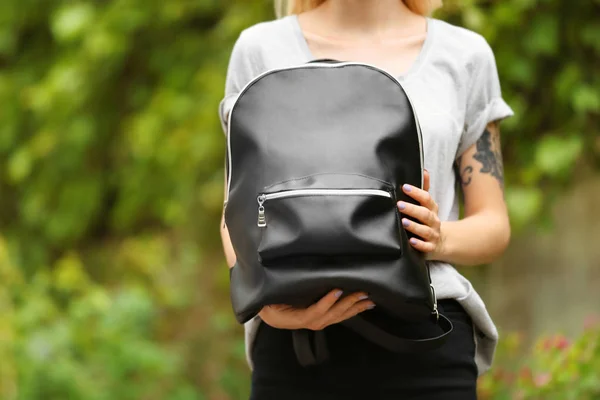 Trendy young woman with leather rucksack — Stock Photo, Image