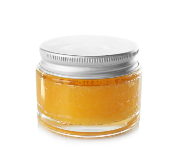 Glass jar with orange scrub — Stock Photo, Image