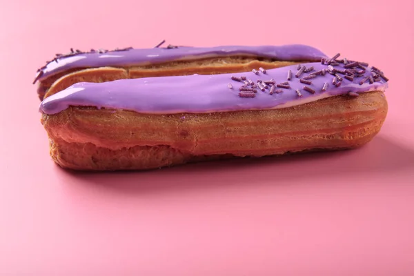 Delicious glazed eclairs — Stock Photo, Image