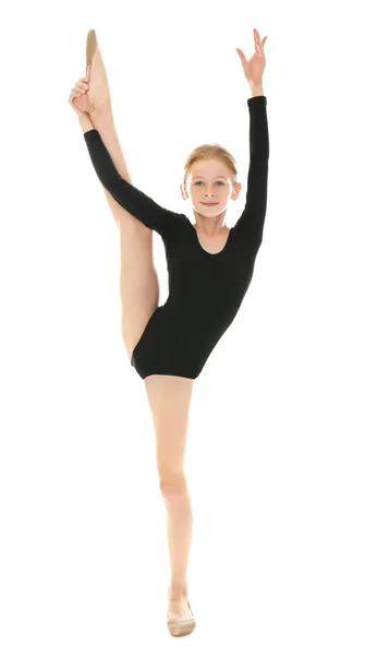 Jong meisje gymnastische oefening doet — Stockfoto
