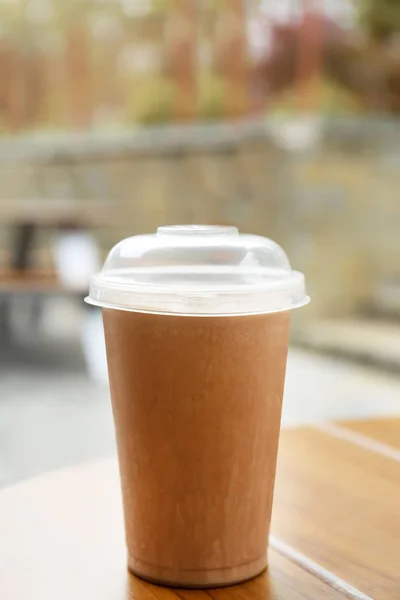 Plastic cup of delicious cool drink — Stock Photo, Image