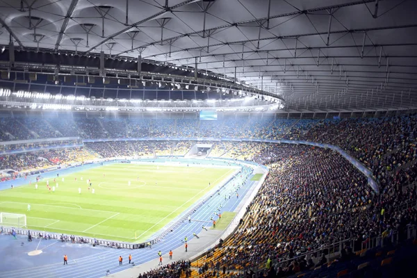 Modern stadium during football match — Stock Photo, Image