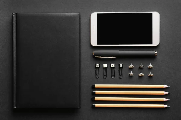 Smartphone and set of stationery — Stock Photo, Image