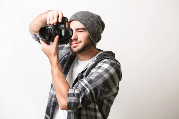 Handsome young photographer — Stock Photo, Image