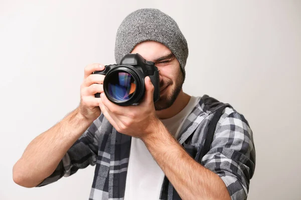Handsome young photographer — Stock Photo, Image
