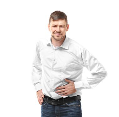 Young man with stomach pain  clipart