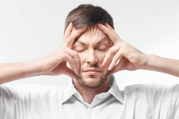 Young man with headache — Stock Photo, Image