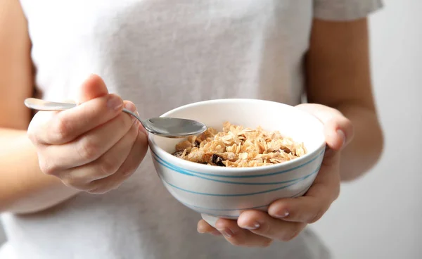 Woman holding bowl with healthy breakfast — Stock Photo, Image