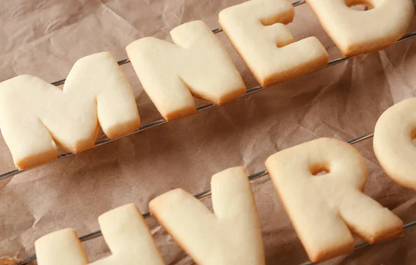 Cookie alphabet on paper — Stock Photo, Image