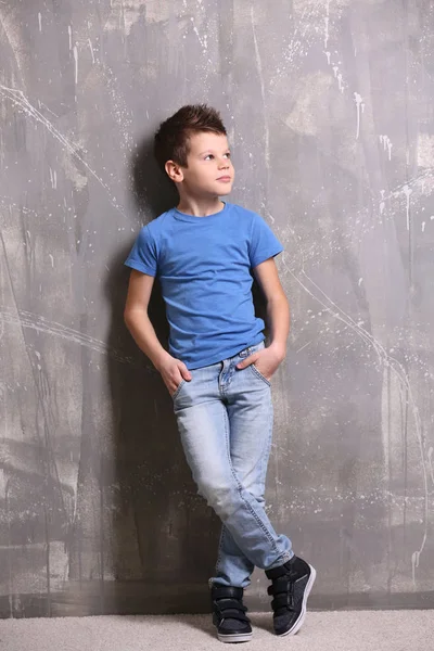 Cute Little Boy Grey Textured Background — Stock Photo, Image