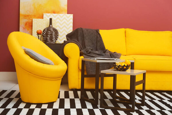 room interior with yellow sofa