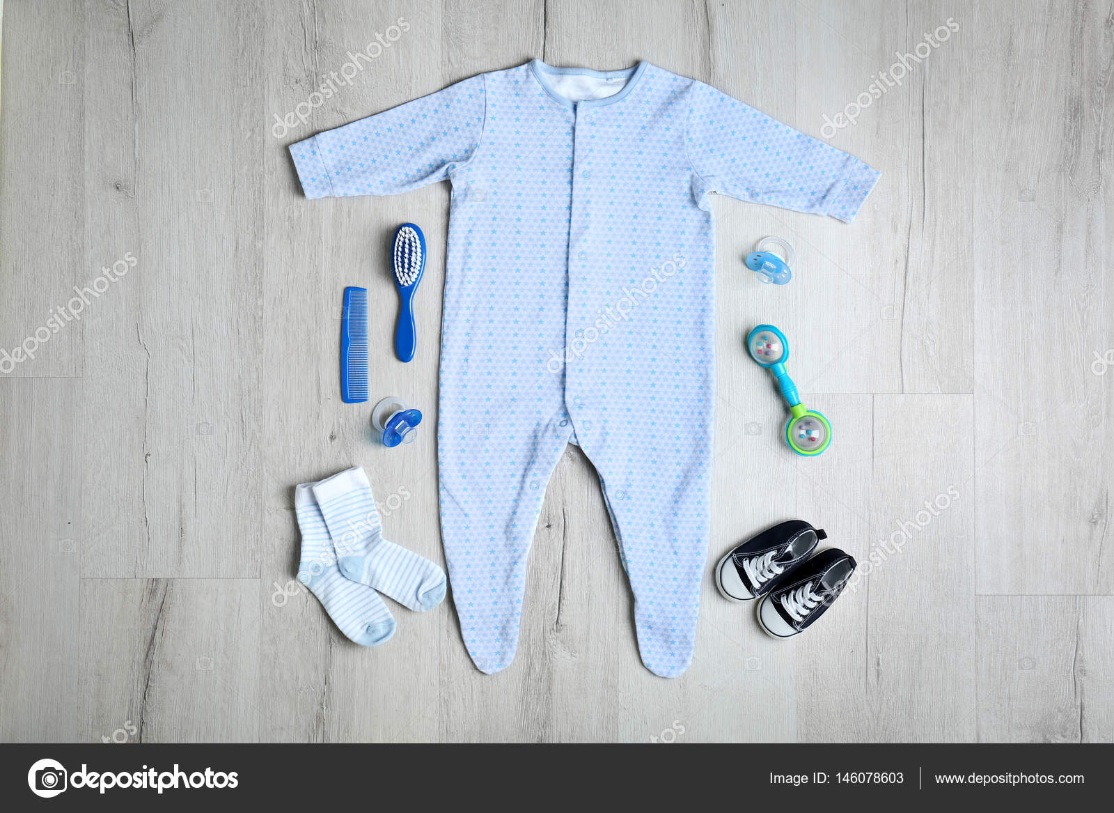 Baby clothes and accessories Stock Photo by ©belchonock 146078603