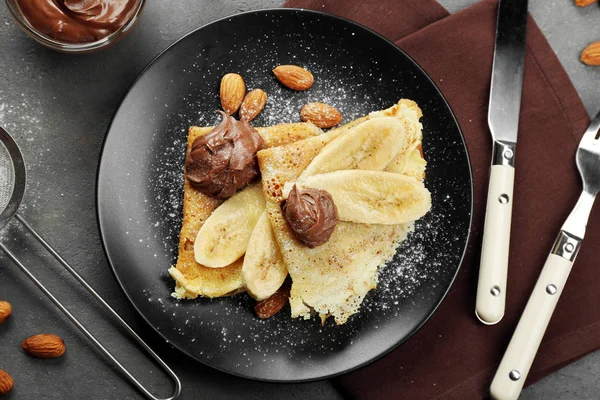 Pancakes with banana and chocolate — Stock Photo, Image