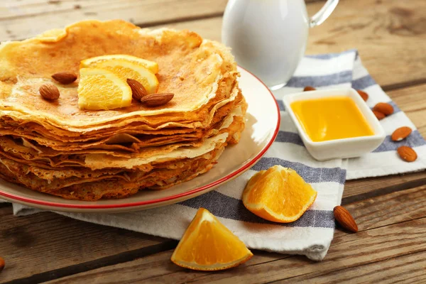 Stack of delicious pancakes with orange — Stock Photo, Image