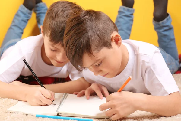 Twin Brothers Drawing Notebook Floor — Stock Photo, Image