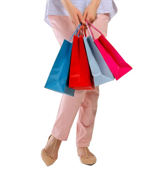 Dames benen en shopping tassen — Stockfoto