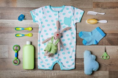 Baby clothes and accessories clipart