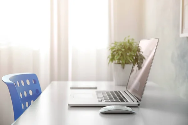 Comfortable workplace with laptop — Stock Photo, Image