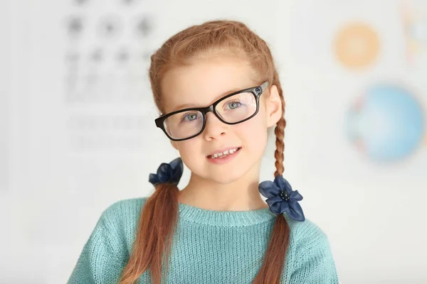 Cute little girl with glasses — Stock Photo, Image