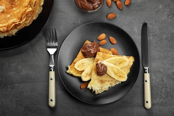 Pancakes with banana and chocolate — Stock Photo, Image