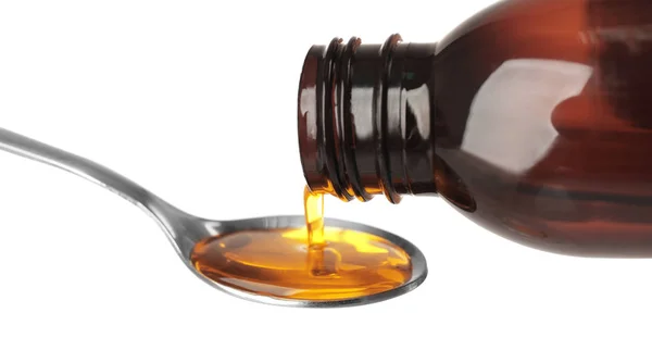 Pouring cough medicine syrup — Stock Photo, Image