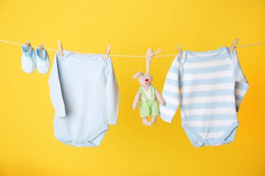 Clothesline with hanging baby clothes